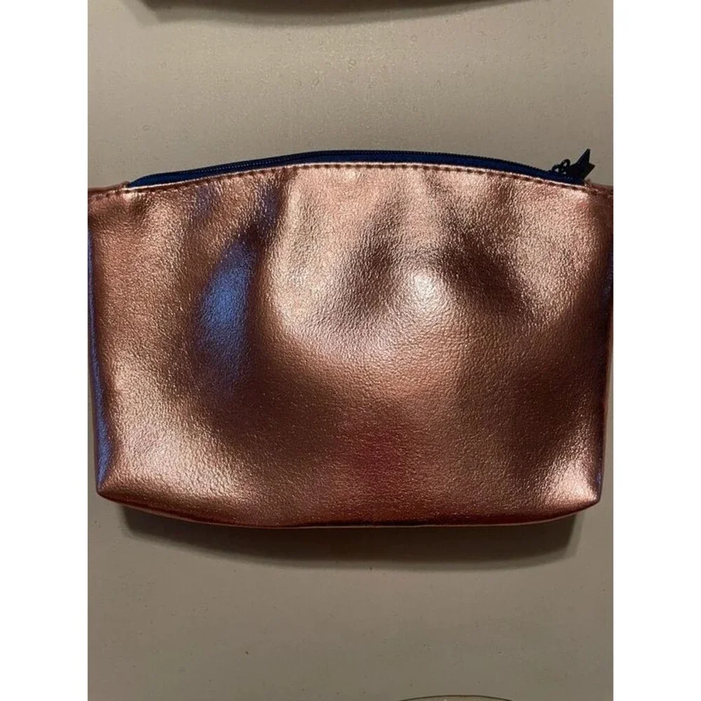 rose gold IPSY metallic makeup bag  “and off she went to change the world